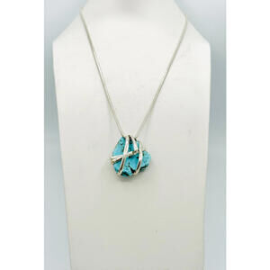 Silver tone snake wrapped silver tone turquoise nugget pendant necklace